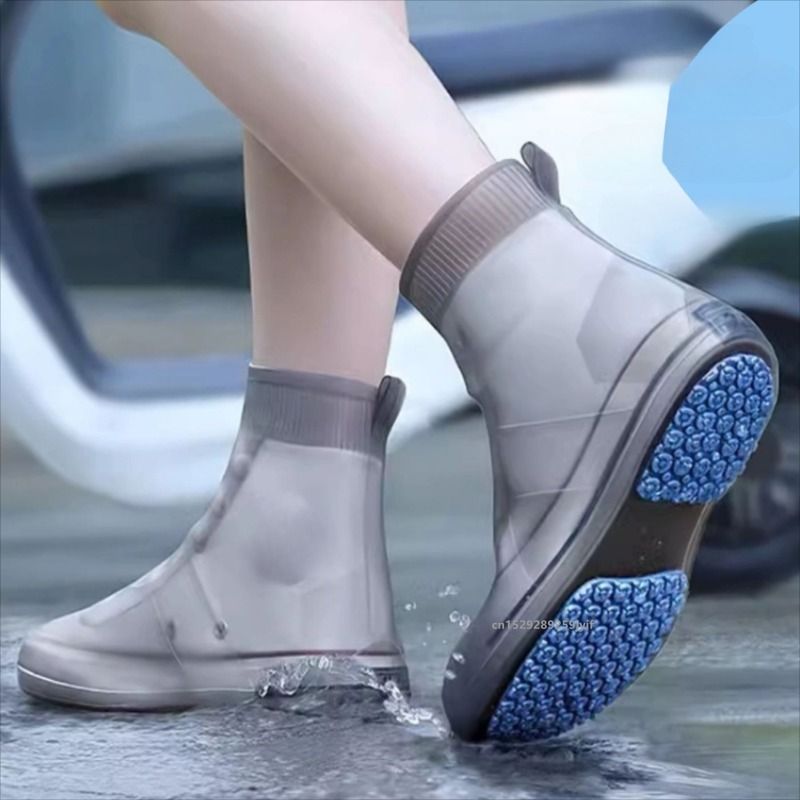 Baby girl's waterproof silicone shoe covers with non-slip grip, reusable outdoor sneaker protectors from Everything Baby.