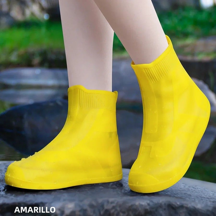 Baby girl waterproof silicone shoe covers with non-slip grip, reusable outdoor sneaker protectors by Everything Baby.