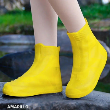 Baby girl waterproof silicone shoe covers with non-slip grip, reusable outdoor sneaker protectors by Everything Baby.