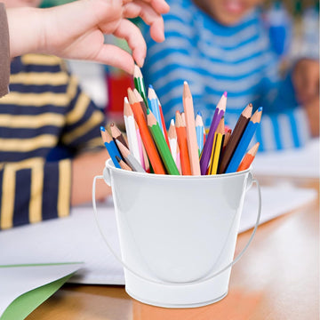 White small metal bucket with handle, galvanized finish, ideal for kids' outdoor play, crafts, or party favors.