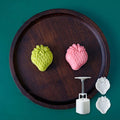 Plastic mooncake mold stamp with strawberry design for DIY baking, suitable for pretend play and creative cooking activities.
