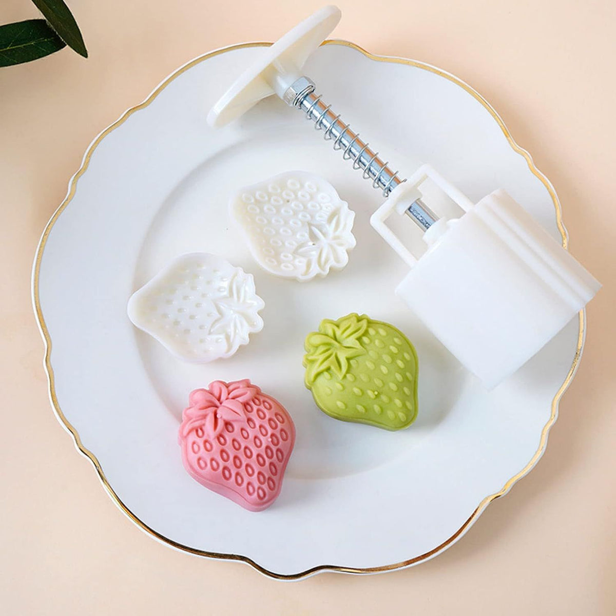 Plastic mooncake mold stamp featuring strawberry design for DIY baking, perfect for Mid-Autumn Festival pretend play with kids.