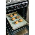 Reusable silicone muffin liners in white, blue, and green for cupcakes and baking, BPA-free, 24-pack from Everything Baby