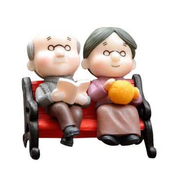 Miniature garden park bench ornament by Everything Baby, designed for landscape decor and outdoor play in kids' gardens.