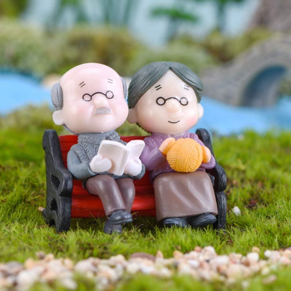 Miniature garden park bench ornament featuring Grandpa and Grandma figures, ideal for outdoor landscape decor and kids' play areas
