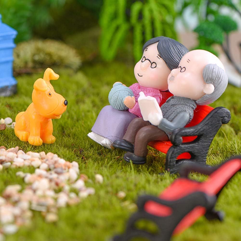 Miniature garden park bench ornament featuring grandpa and grandma figures, for outdoor landscape decor and miniature garden scenes.