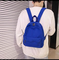 Blue mini backpack purse for teen girls and women, stylish small accessory bag for kids over 3 years old, from Everything Baby.