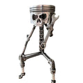 Handmade carved piston skull face sculpture made of metal, detailed skeleton face art figurine for creative display.