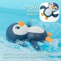Blue wind-up penguin bath toy from Everything Baby, designed for kids' pretend play and bath time fun.