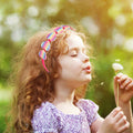 Six colorful rainbow glitter headbands with sparkling star accents for baby girls, designed by Everything Baby.