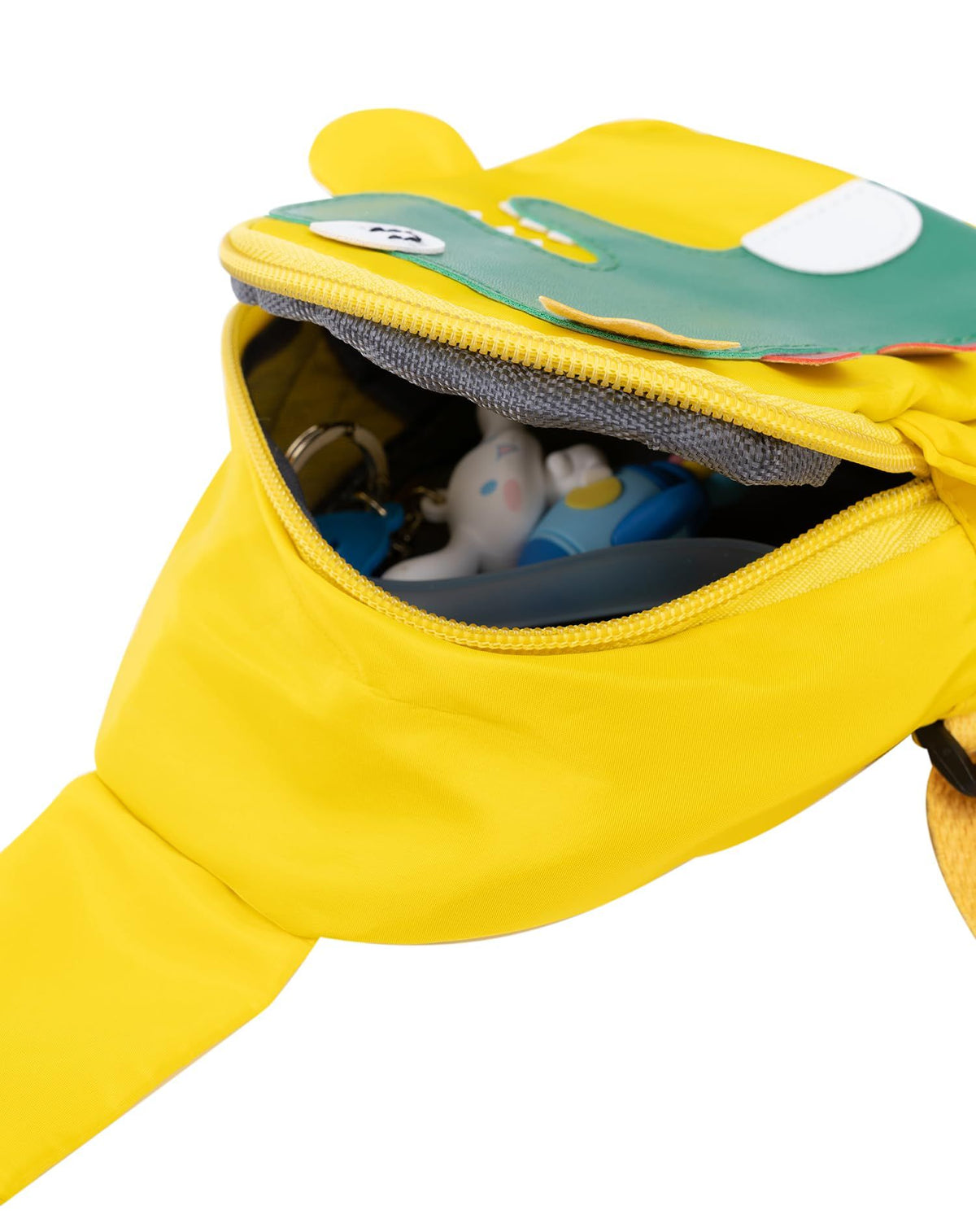 Cute children's sling bag with a cartoon crown dinosaur design, nylon crossbody shoulder bag and coin purse for kids.