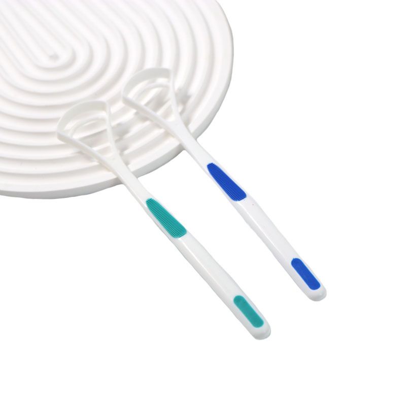 Baby tongue scraper cleaner from Everything Baby, gentle oral cleaning tool to help freshen breath and promote oral hygiene for kids.