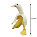 Whimsical banana duck sculpture by Everything Baby, outdoor garden statue featuring a playful duck with a peeled banana body.