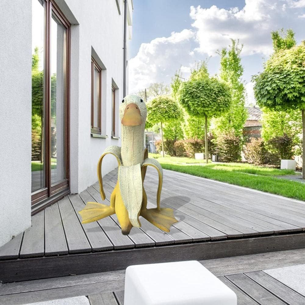 Creative banana duck sculpture by Everything Baby, whimsical yellow duck with banana body garden statue for indoor or outdoor yard decor.