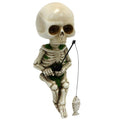 White mini skeleton figurines for home decor, 4.5-inch resin Halloween craft accessories, ideal for haunted house decorations.