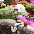White 4.5-inch resin mini skeleton figurine for Halloween home decor and haunted house accessories, ideal for craft and toy displays.