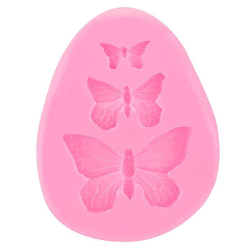 Pink butterfly fondant mold for cake decorating, gummy candy, and chocolate shaping, suitable for baking and polymer clay crafts.
