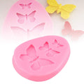 Pink butterfly fondant mold for cake decorating, gummy candy, and chocolate shaping, ideal for baking and polymer clay crafts.