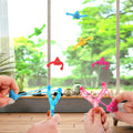 Five mini rubber finger flying poop toys for kids and adults, stretchy prank stress relief toys for pretend play and party fun.