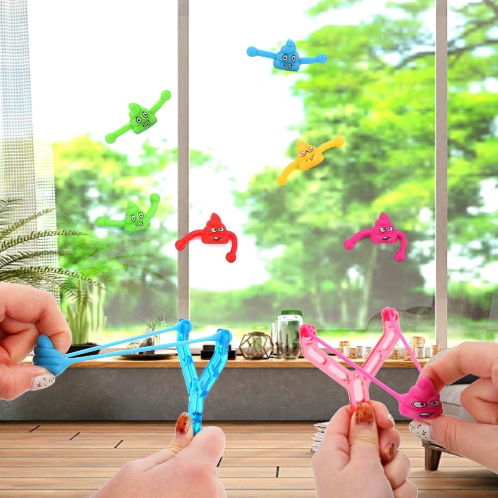 Five mini rubber finger flying poop toys for kids and adults, stretchy prank stress relief toys for pretend play and party fun.