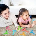 Set of 5 mini rubber finger flying poop toys for kids and adults, fun stress relief prank squishy toys for pretend play and party gifts.