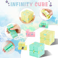 Four colorful cube puzzle toys for kids and adults, designed for stress relief, sensory play, and fun by Everything Baby.
