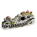 Resin dinosaur skull garden statue with snails and plants, outdoor decorative sculpture for eco-friendly garden decor.