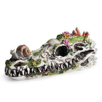 Resin dinosaur skull garden statue with snails and plants, outdoor decorative sculpture for eco-friendly garden decor.