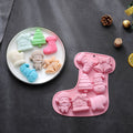 Two silicone Christmas molds for chocolates, jellies, and soap, featuring festive holiday designs for baking and crafts.
