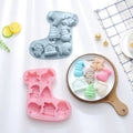 Set of two Christmas silicone molds for chocolates, jellies, and soap, featuring festive holiday designs for baking and crafts.