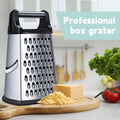 Four-sided stainless steel cheese grater with detachable container by Everything Baby, ideal for shredding cheese and food prep.