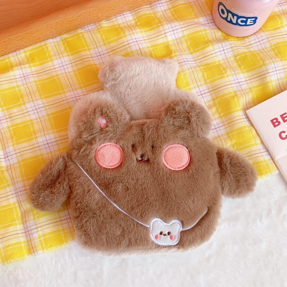 Cartoon hot water bottle with plush cover, portable hand warmer for kids, designed for safe, cozy pretend play and comfort.