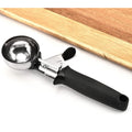 Ergonomic baby ice cream scoop with trigger and soft handle, ideal for serving frozen treats and baby feeding.