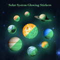 Set of 9 glow-in-the-dark planet wall stickers featuring Sun, Earth, and other planets for kids' room decor and art.