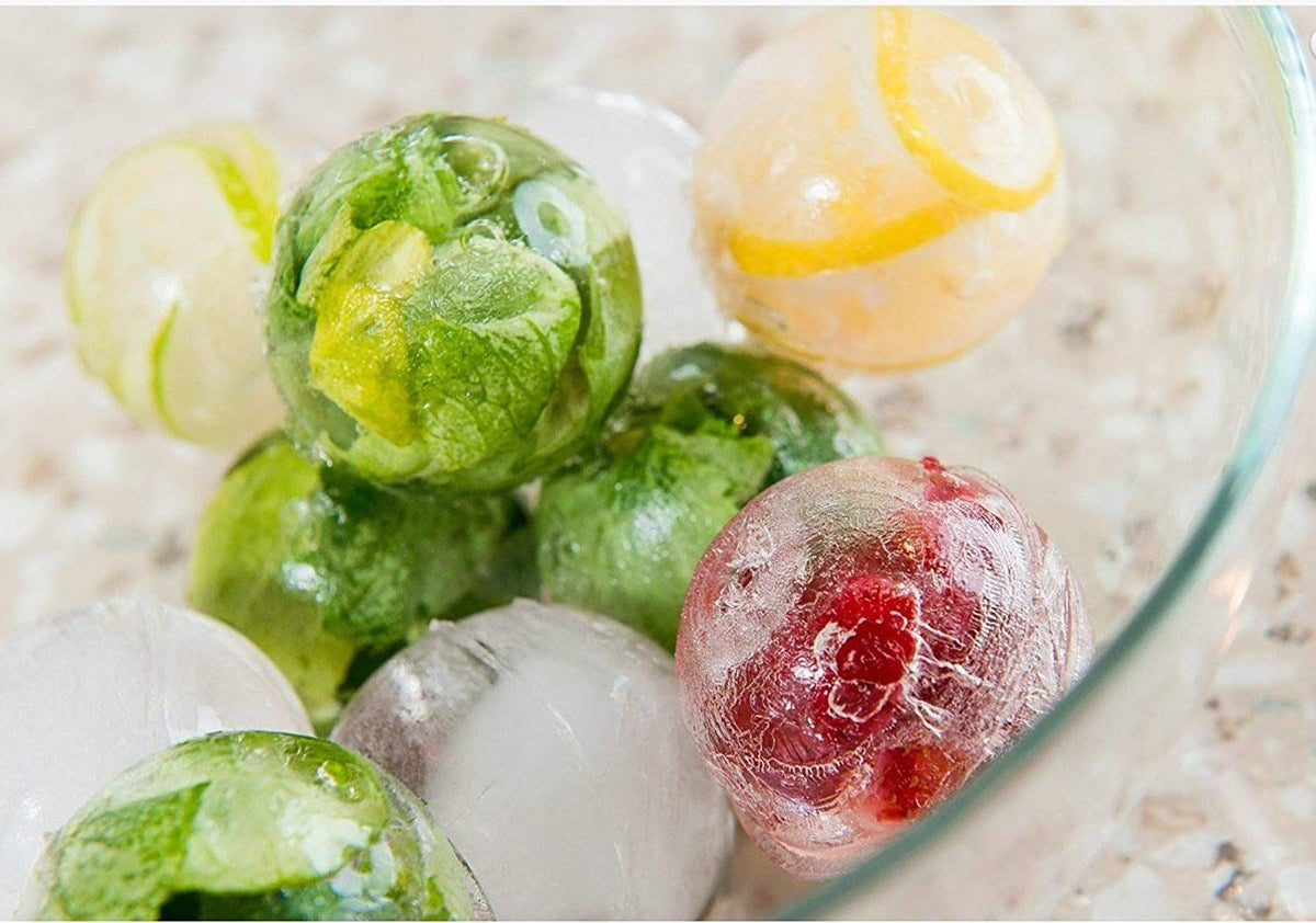 Silicone ice mold tray for making ice balls, gummies, and jello in fun shapes, ideal for kitchen and pretend play setups.
