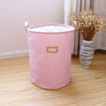 Foldable cotton and linen laundry and toy storage basket by Everything Baby, featuring a soft, foldable design for kid's room organization.