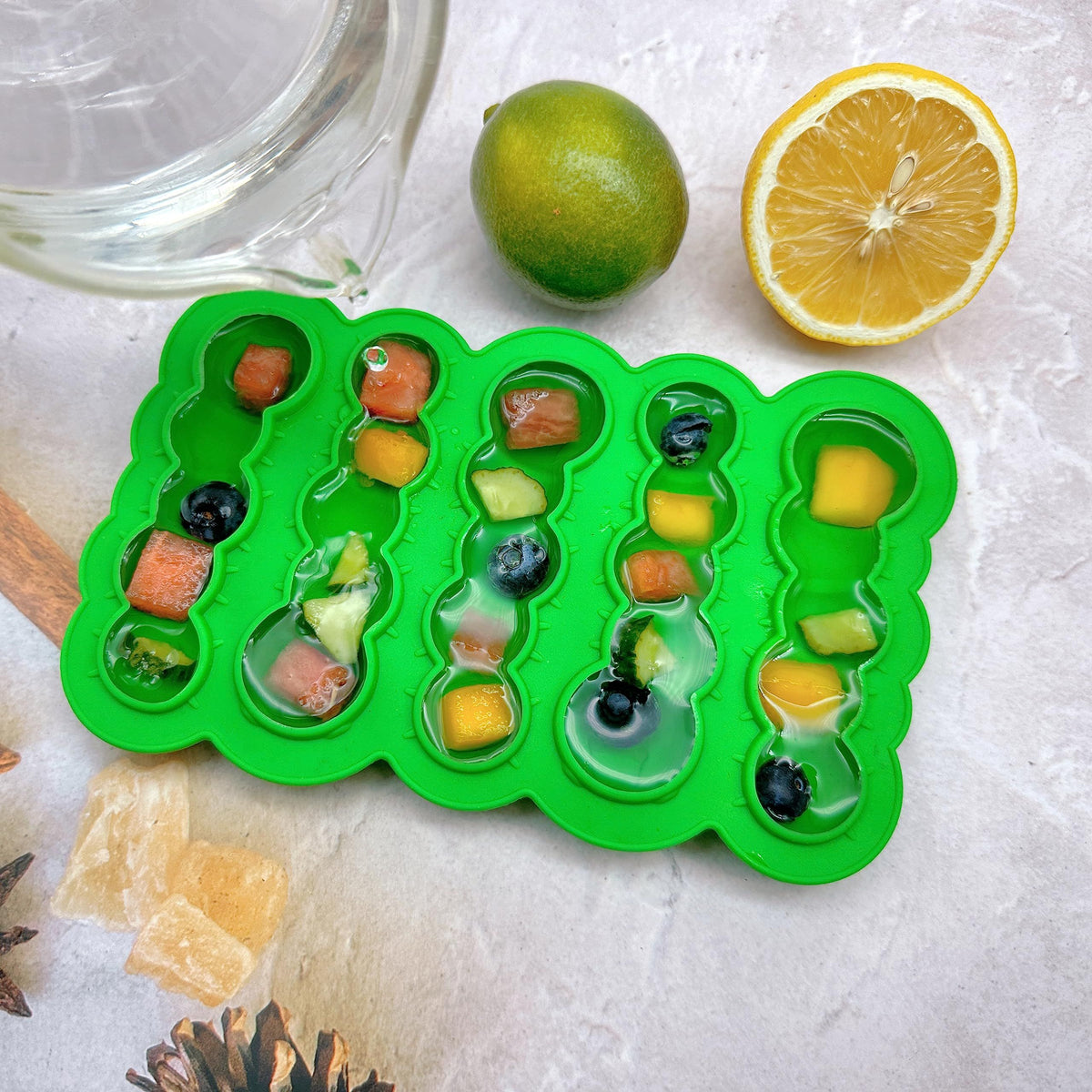 Colorful silicone ice cube mold with fun shapes, suitable for freezing foods, ice, and chocolate, designed for baby and kids feeding.