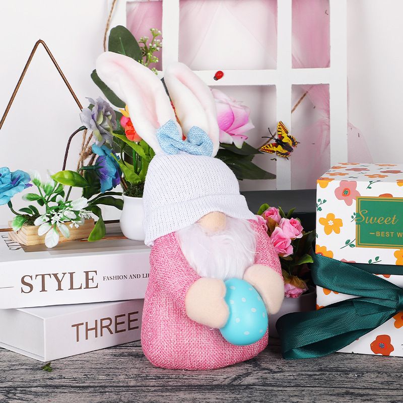 Handmade baby and kids Easter Bunny gnome plush dolls with Easter eggs, perfect for spring decor and pretend play.