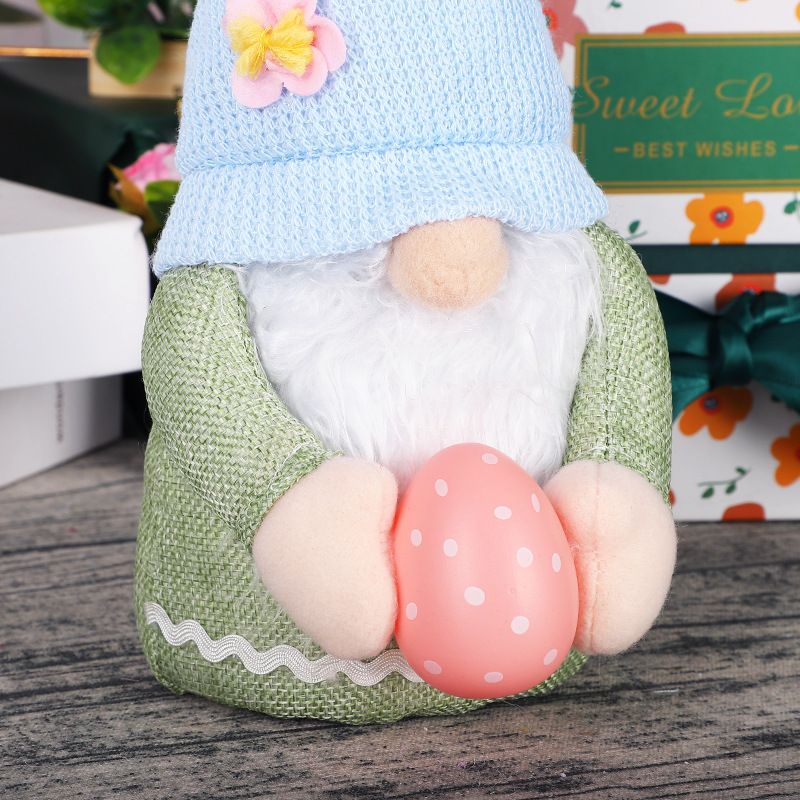 Two handmade Easter Bunny gnome plush dolls with Easter eggs, perfect for spring decor and children's pretend play.