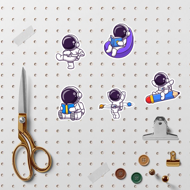 Set of 83 waterproof vinyl astronaut stickers for kids, featuring colorful space-themed designs for laptops and tablets.