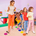 Set of 30 multicolor classroom spot stickers for kids, round rug markers, ideal for preschool outdoor play and activity spaces.