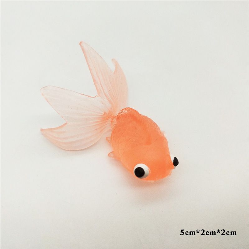 Five colorful plastic fake goldfish ornaments for aquariums, realistic moving fish toys for kids' building and pretend play.