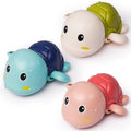 Three Little Turtle Baby Bath Toys by Everything Baby in a ball pit, children playing and swimming in water.