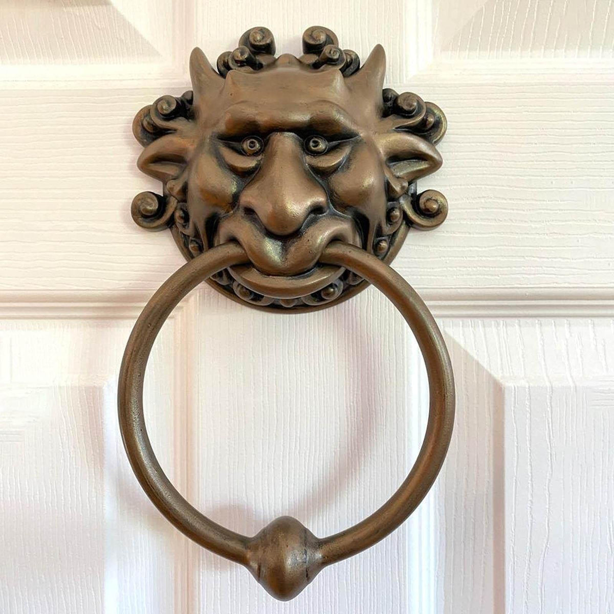 Set of two bronze wall-mounted dragon face door handles with whimsical carvings, suitable as decorative home gift statues