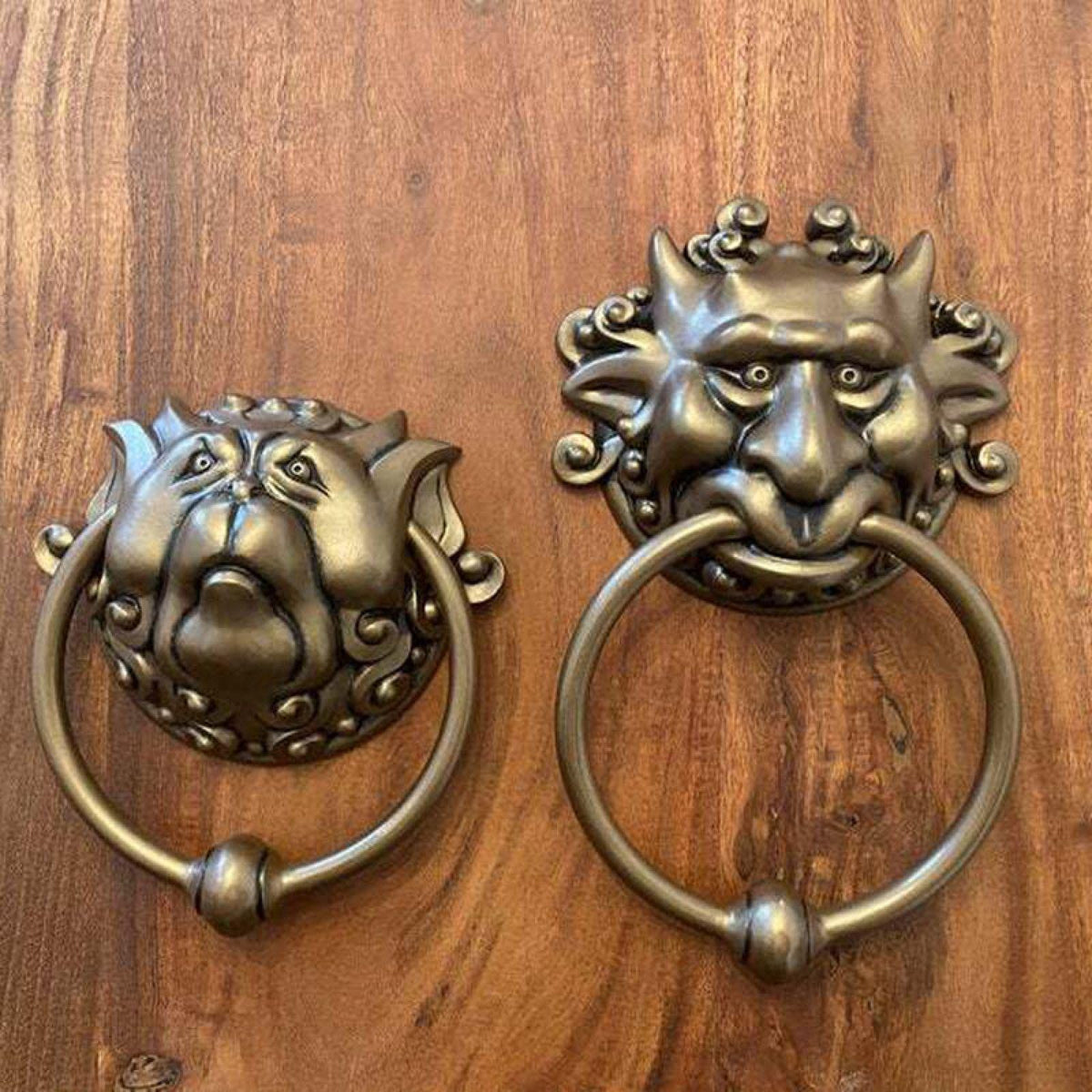 Bronze dragon face door handle with whimsical design, wall-mounted home decor and gift statue for outdoor use.
