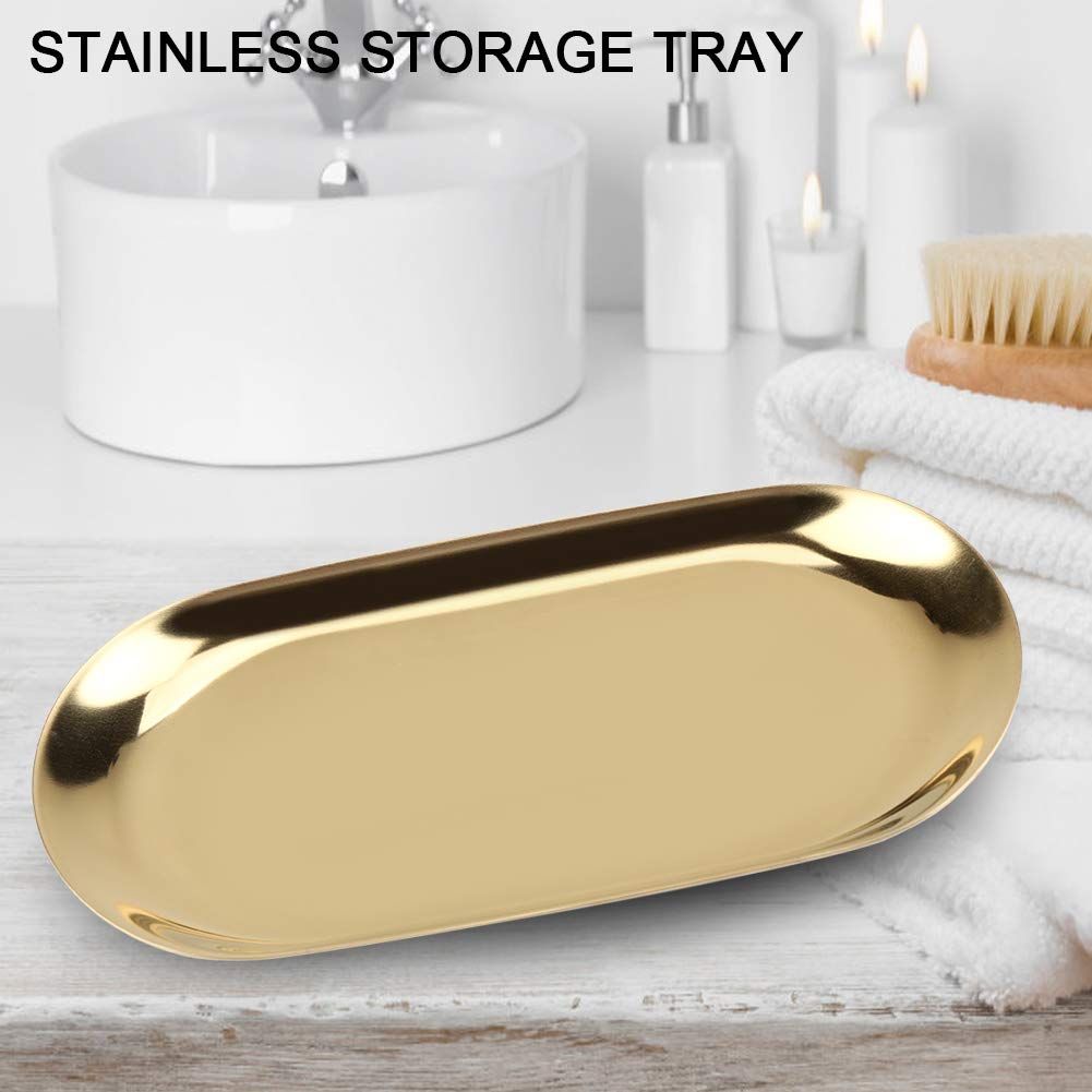 Gold oval decorative tray from Everything Baby, stainless steel jewelry, perfume, or vanity tray for nursery and bathroom decor.