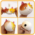 Two cute cat-shaped tension and stretching balls for stress relief, sensory play, suitable for children and adults.