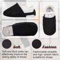 Pair of black bowling shoe covers from Everything Baby, designed for men and women, shown on a pair of bowling shoes.