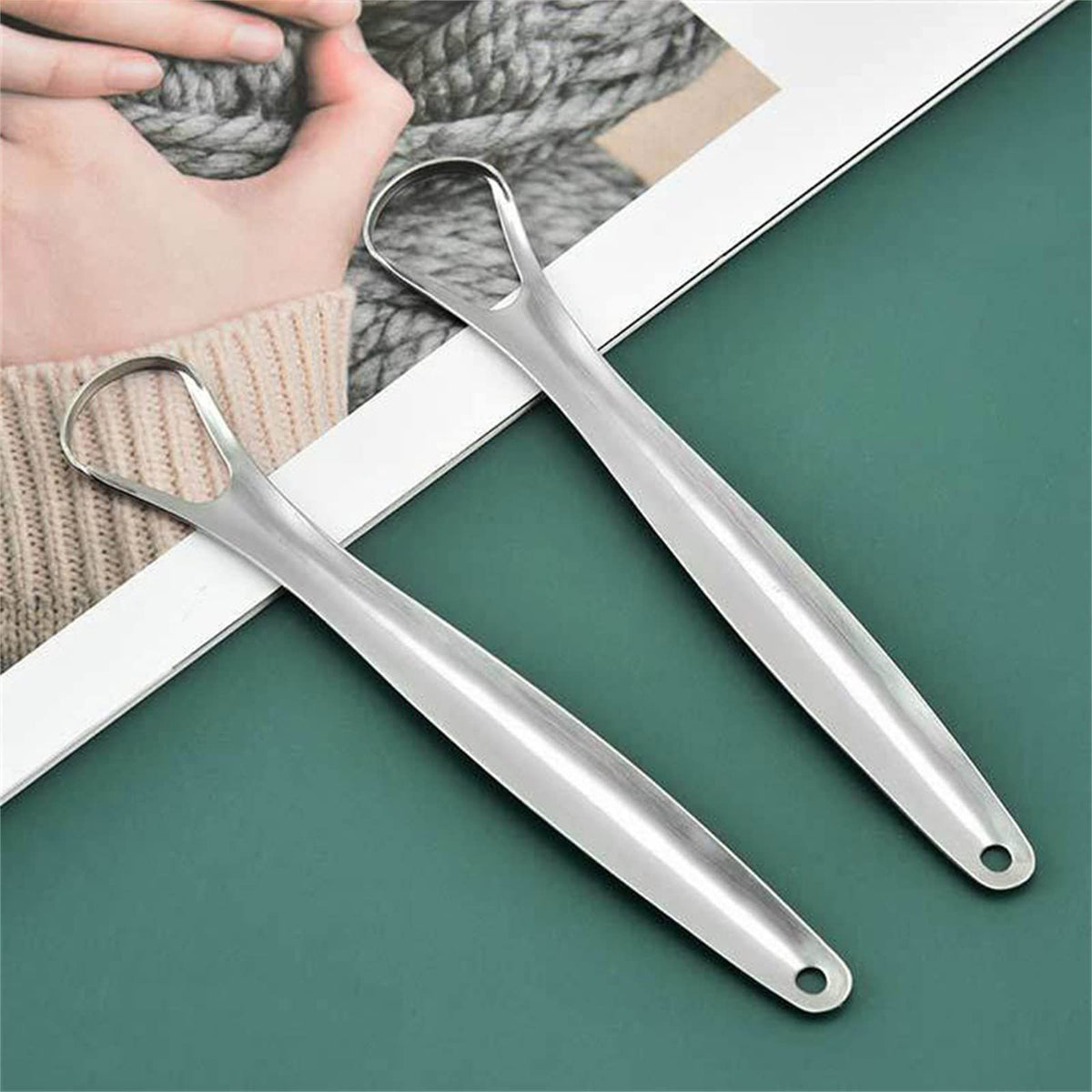 Two reusable tongue scrapers for fresh breath and oral hygiene, suitable for adults and kids, from Everything Baby.