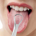 Two reusable tongue scrapers by Everything Baby for fresh breath and oral health, suitable for adults and kids.